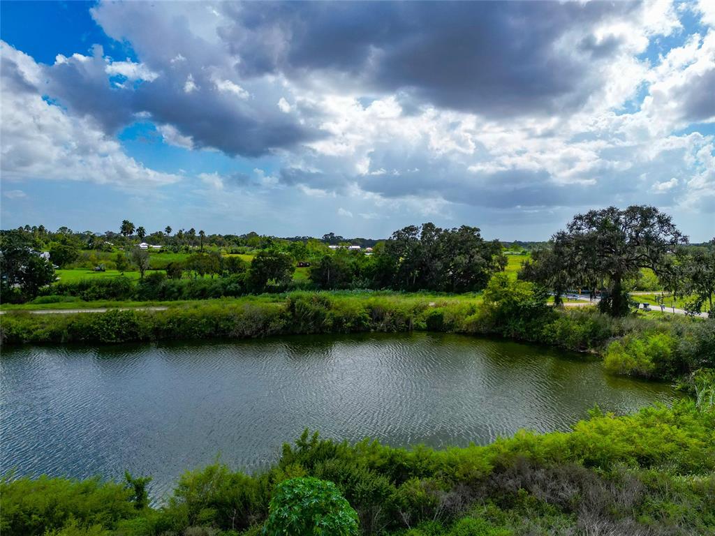 301 E Road Sarasota, FL 34240 - Photo 29 of 32 an aerial view of a garden with houses