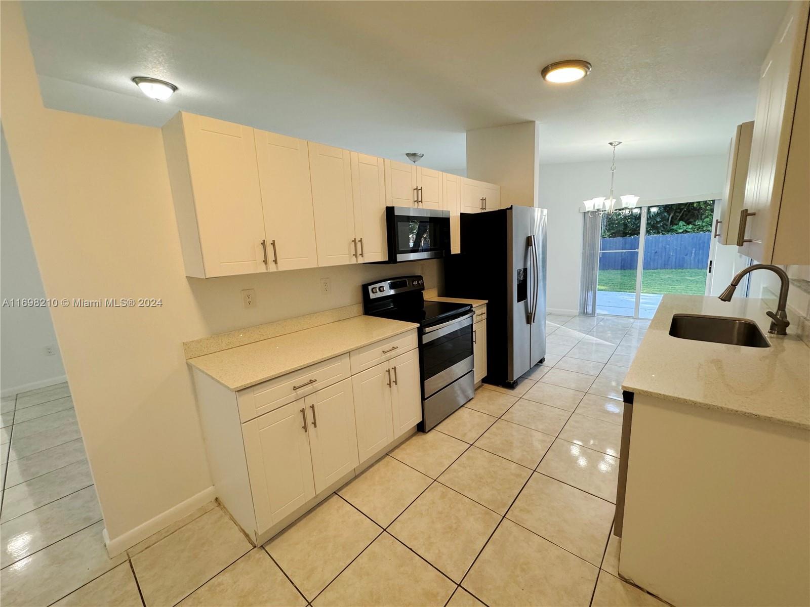 12068 Southwest 210th Street Miami, FL 33177 - Photo 5 of 22