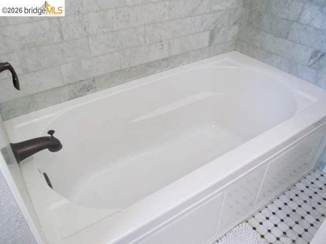 2807 Filbert Street Oakland, CA 94608 - Photo 12 of 12 a bathroom with a bathtub