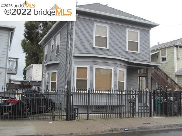 2807 Filbert Street Oakland, CA 94608 - Photo 2 of 12 a view of a brick house with many windows