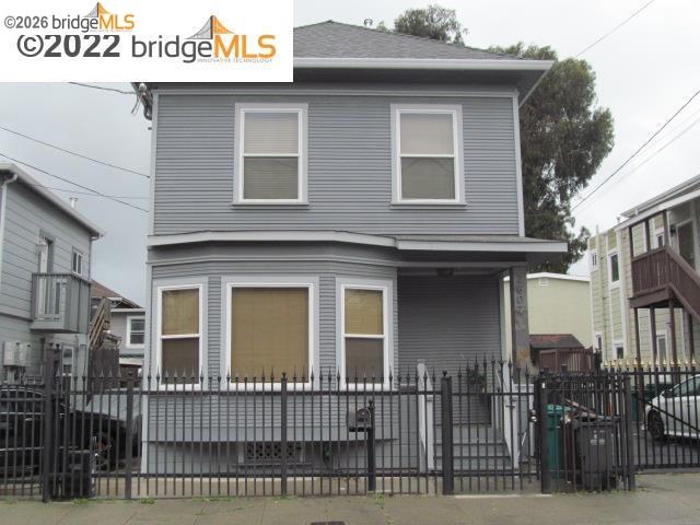 2807 Filbert Street Oakland, CA 94608 - Photo 3 of 12 a view of a brick house with many windows