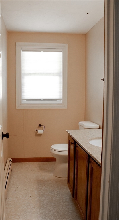 25 Bear Hill Road Gardner, MA 01440 - Photo 11 of 39 a bathroom with a sink a toilet and a window