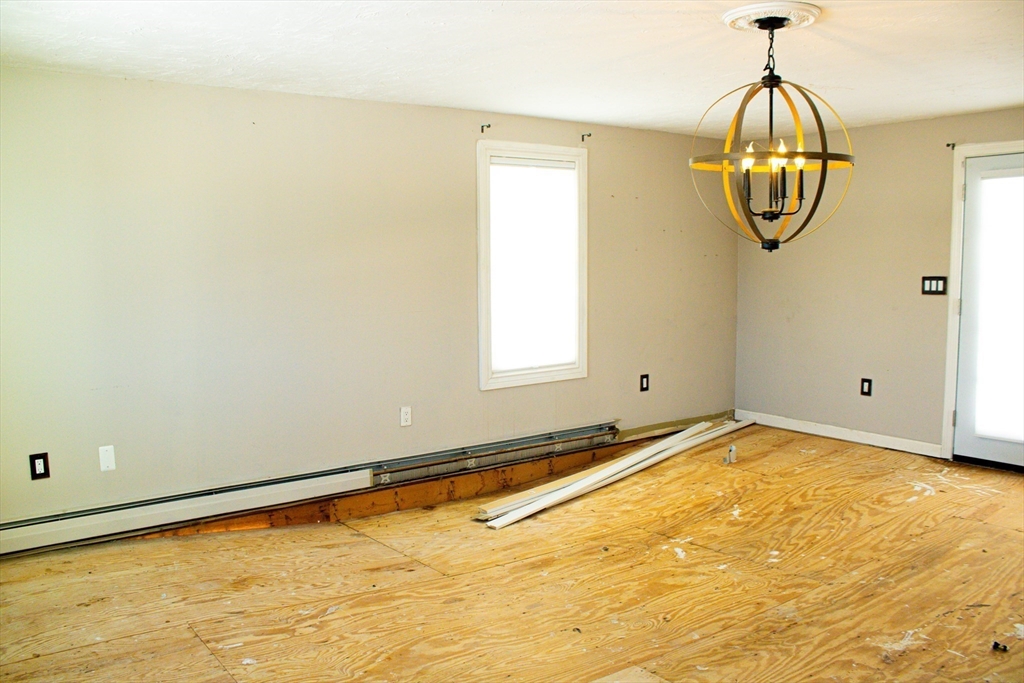 25 Bear Hill Road Gardner, MA 01440 - Photo 14 of 39 a room with wooden floor and pool table