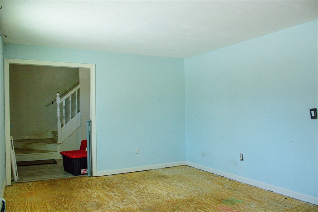 25 Bear Hill Road Gardner, MA 01440 - Photo 17 of 39 a room with a wooden floor and natural light
