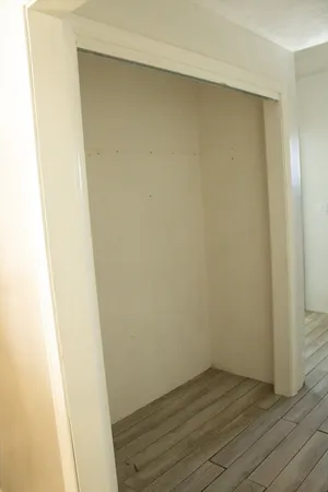 a view of small space with wooden floor