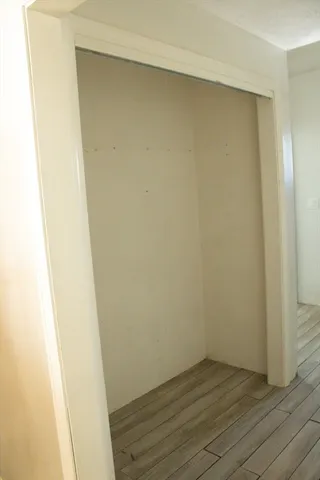 a view of small space with wooden floor