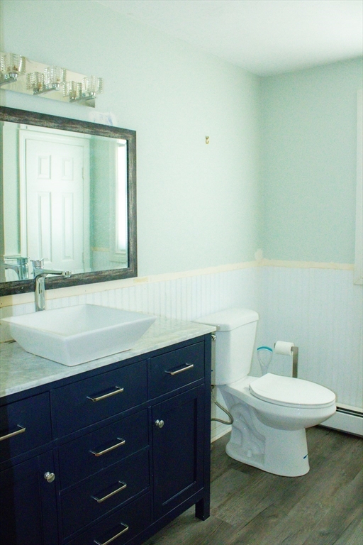 25 Bear Hill Road Gardner, MA 01440 - Photo 24 of 39 a bathroom with a toilet sink and mirror