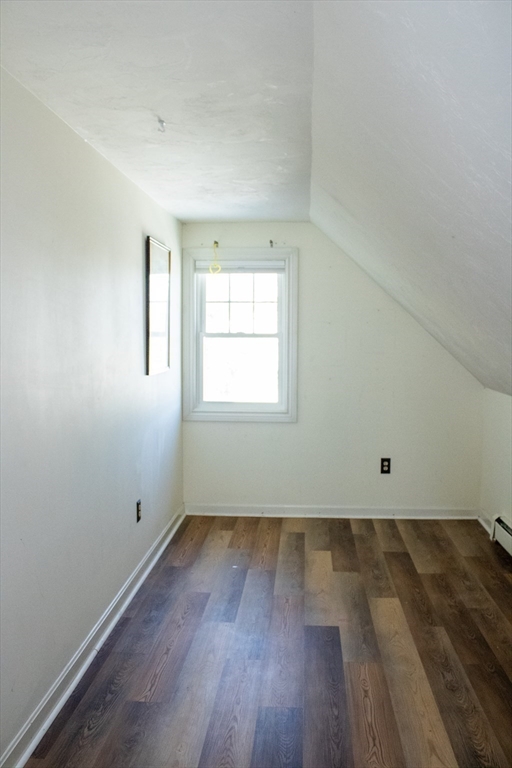 25 Bear Hill Road Gardner, MA 01440 - Photo 27 of 39 an empty room with wooden floor and windows