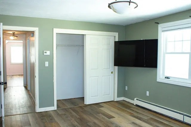 a view of entryway with bathroom