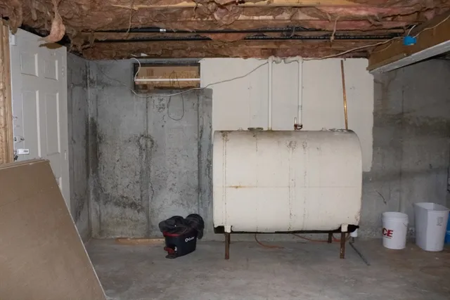 a view of a room with wooden walls