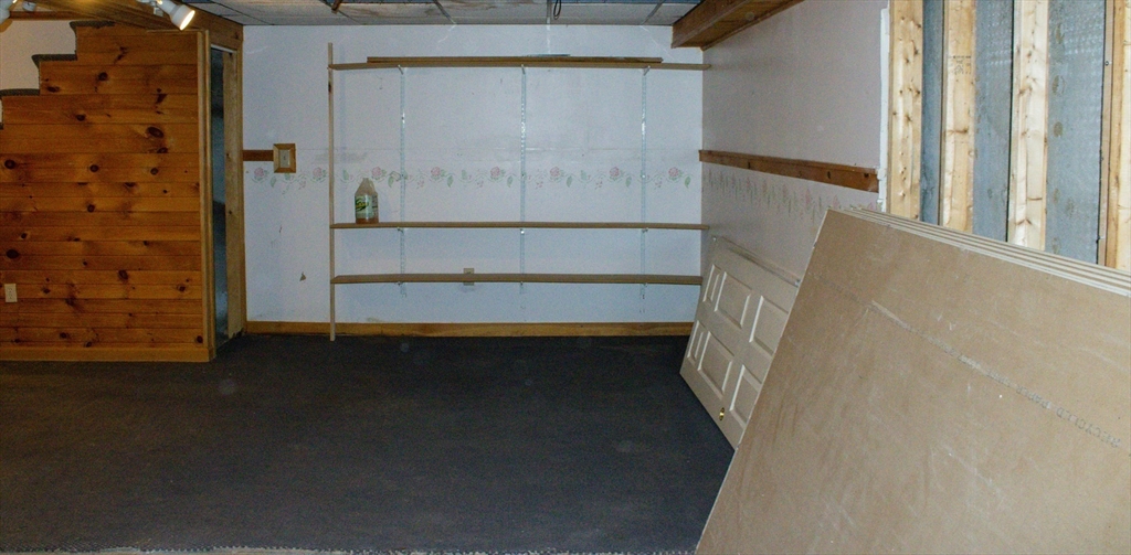 25 Bear Hill Road Gardner, MA 01440 - Photo 37 of 39 a bathroom with a bathtub and shower