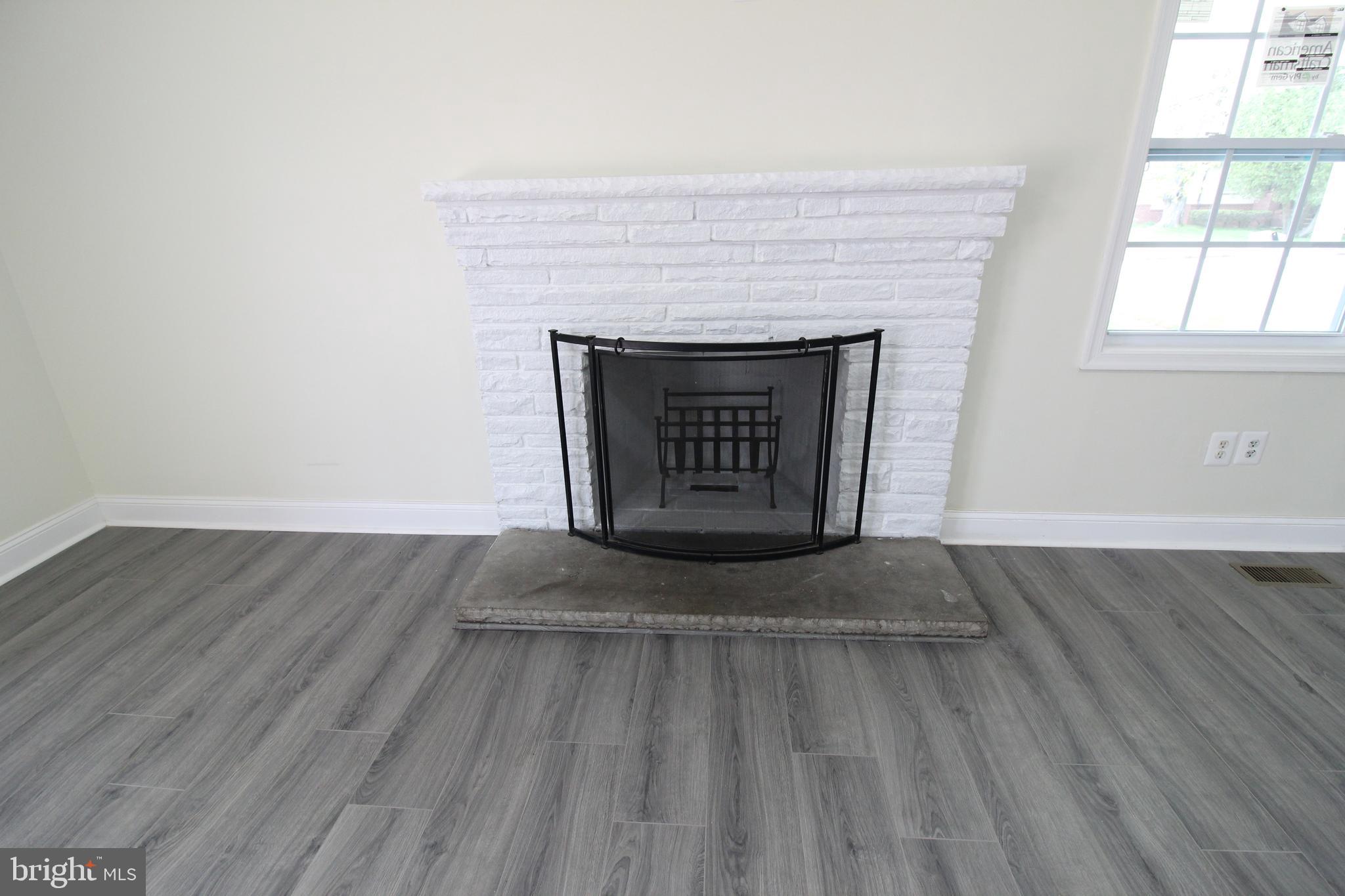 7300 Castlemoor Road Baltimore, MD 21244 - Photo 12 of 40 Wood burning fireplace