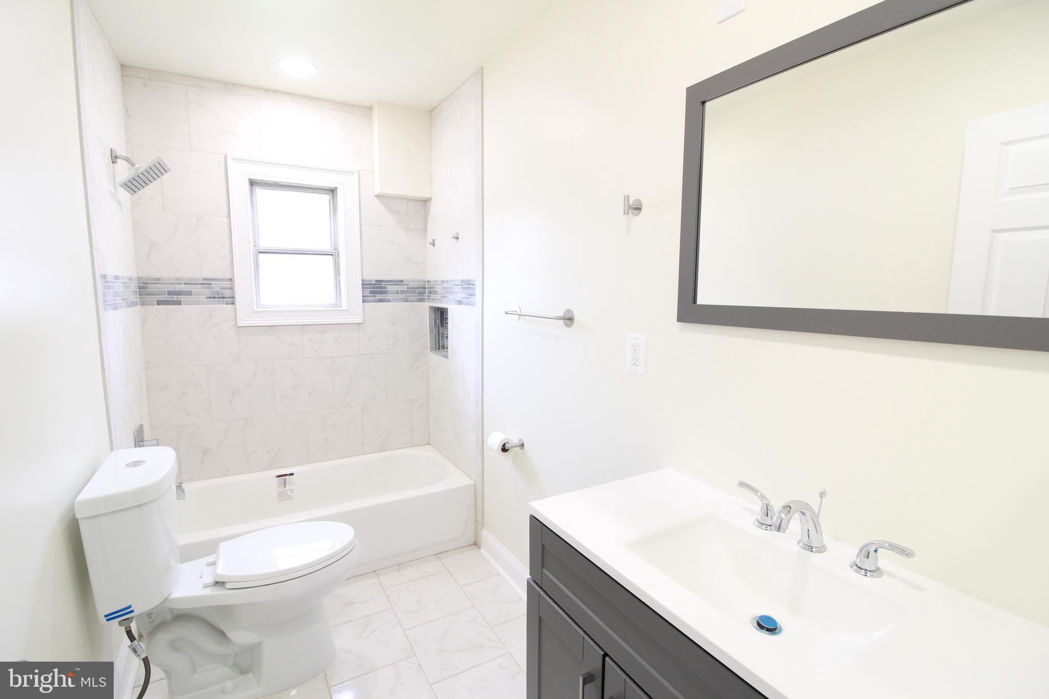 7300 Castlemoor Road Baltimore, MD 21244 - Photo 18 of 40 Hallway Full Bathroom