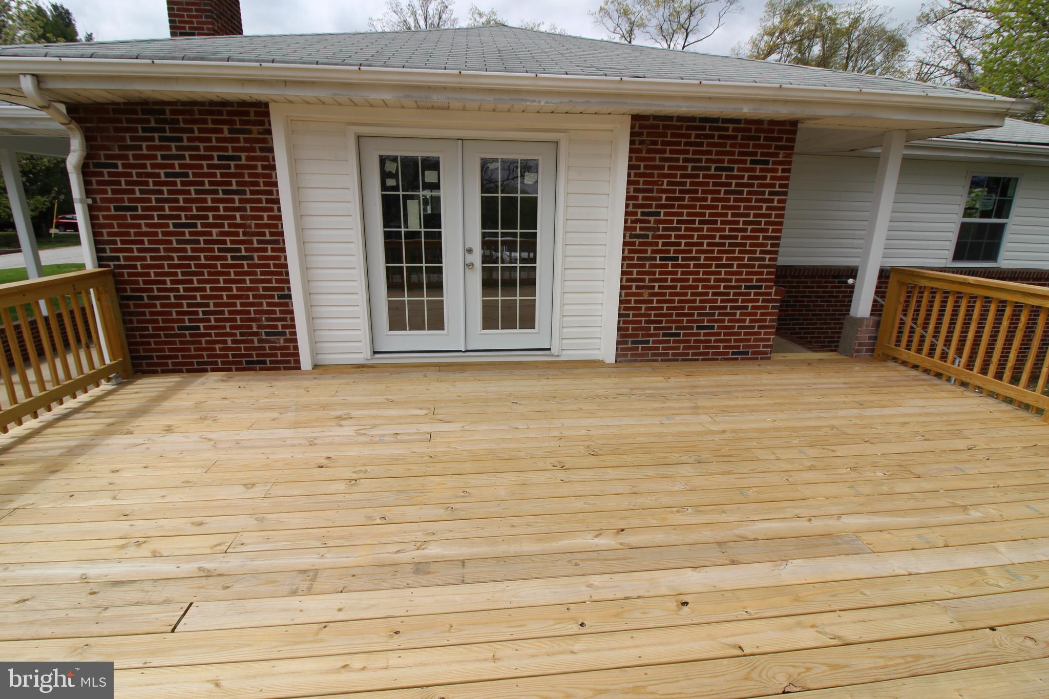 7300 Castlemoor Road Baltimore, MD 21244 - Photo 31 of 40 French doors from living room to deck