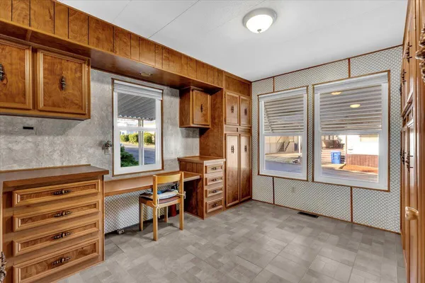 a room with furniture and window