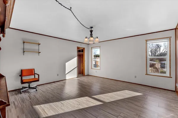 a view of livingroom with furniture and wooden floor