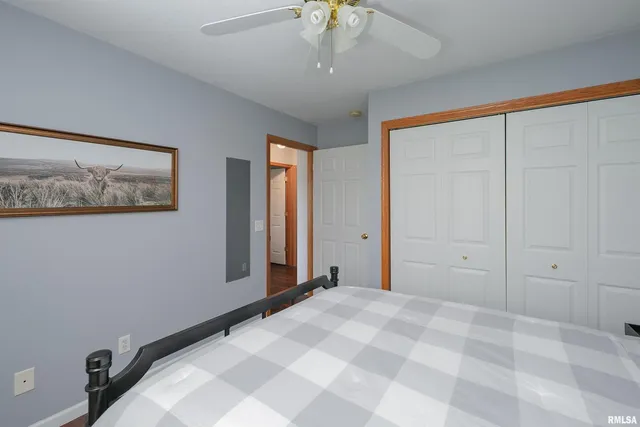 a white toilet sitting next to a bath tub