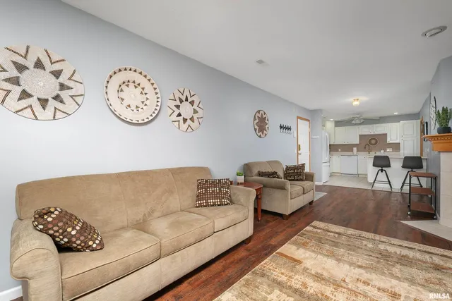 a view of kitchen with furniture and wooden floor