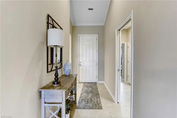 $7,000 | 9433 Benvenuto Court, Unit 201, Naples, FL 34119