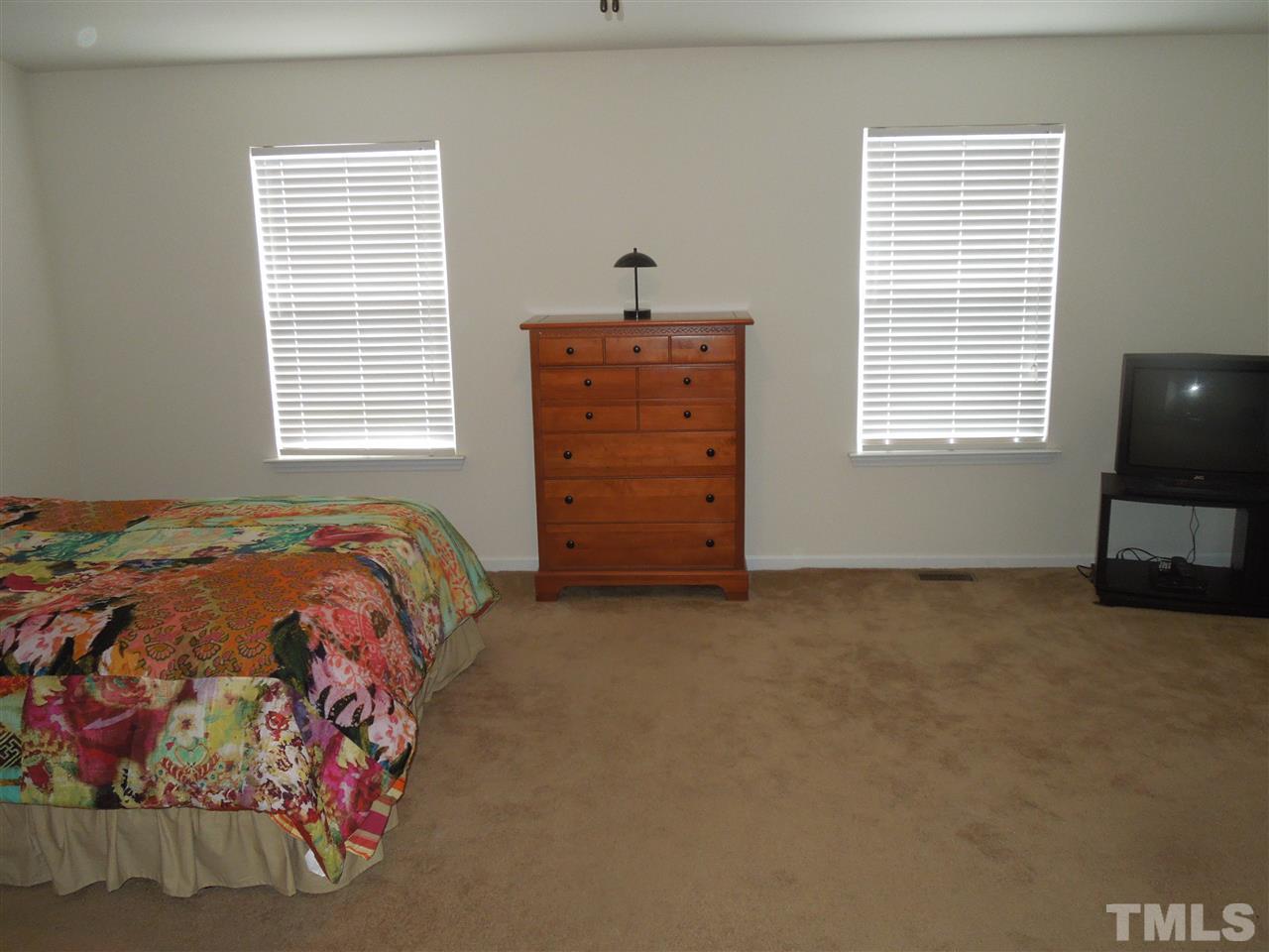 320 Gilman Lane, Unit 108 Raleigh, NC 27610 - Photo 13 of 22 Huge light-filled master suite on third floor