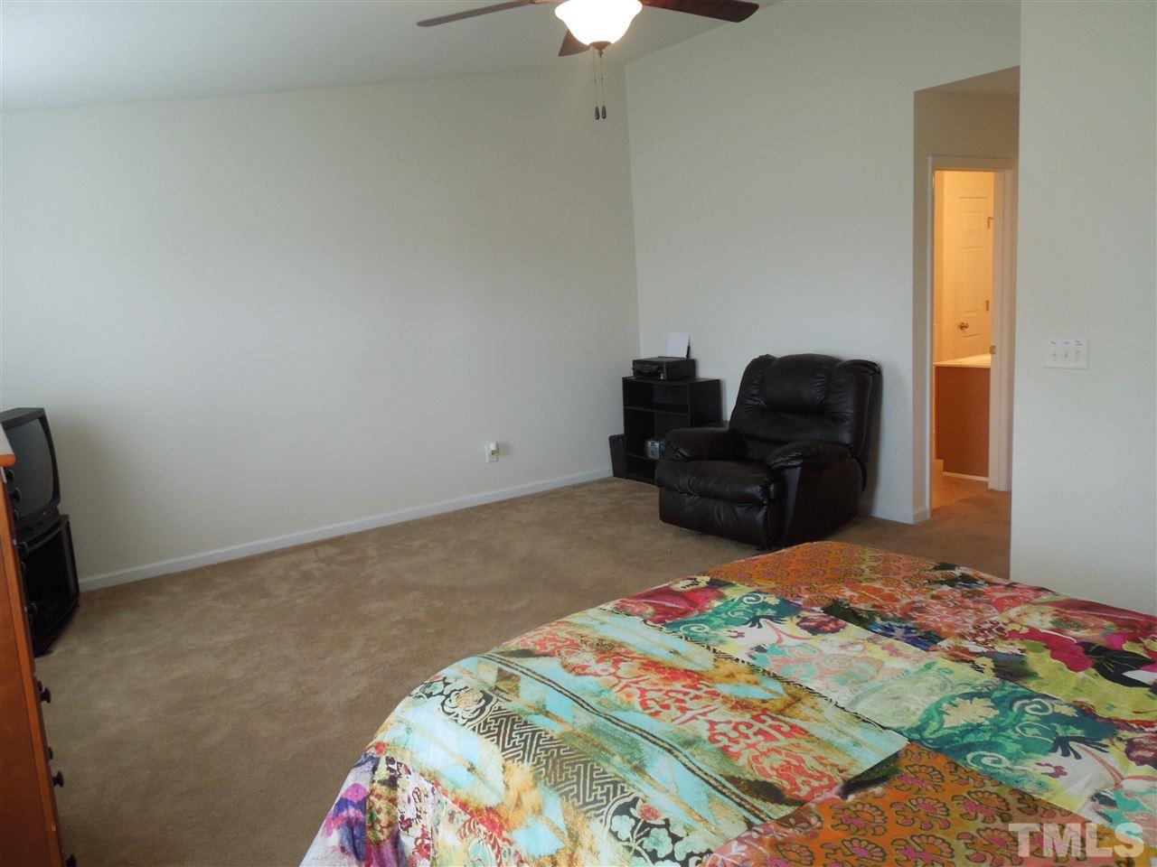 320 Gilman Lane, Unit 108 Raleigh, NC 27610 - Photo 16 of 22 Bedroom has large sitting area