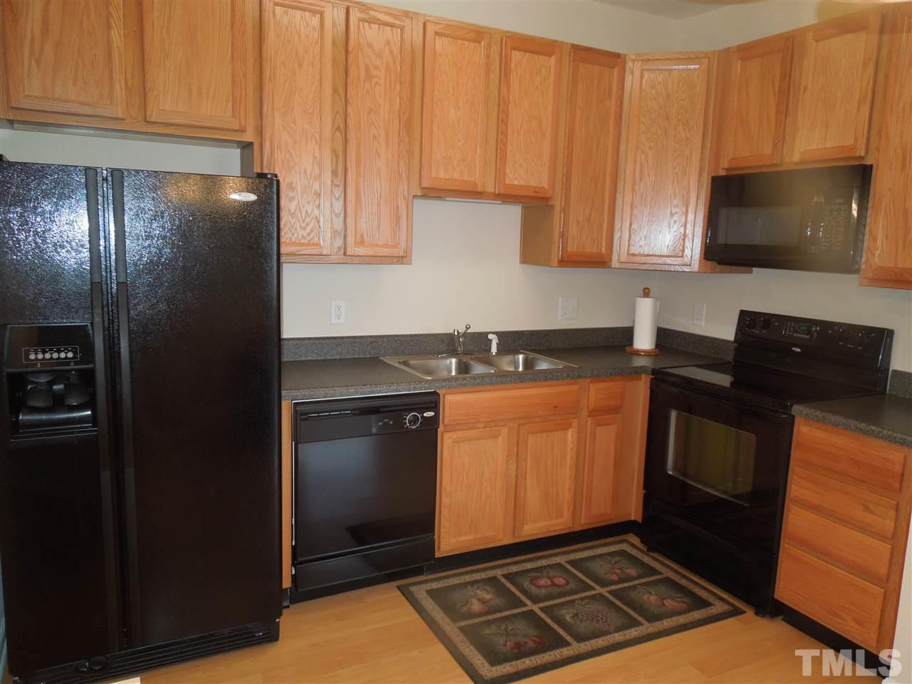 320 Gilman Lane, Unit 108 Raleigh, NC 27610 - Photo 5 of 22 Plenty of kitchen storage space and refrigerator stays!