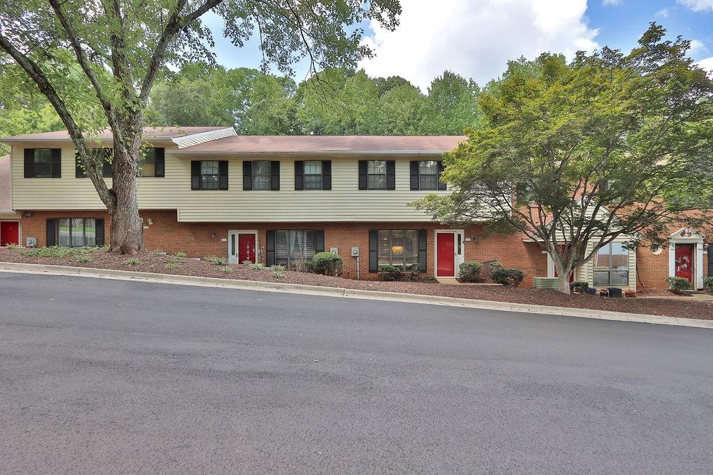 1245 Jamestowne Trail Alpharetta, GA 30009 - Photo 1 of 1 front view of a house with a street
