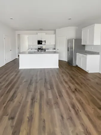 a view of ocean with a big yard