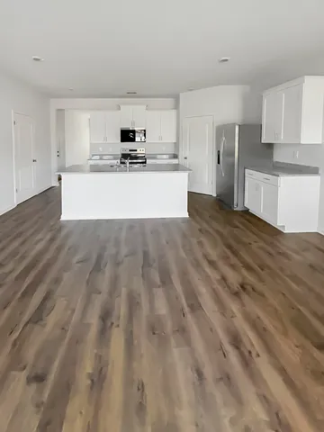 a view of ocean with a big yard