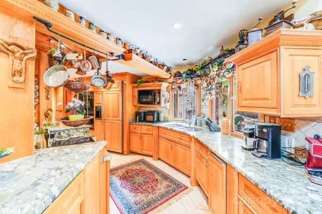 a dining space with furniture and outdoor view
