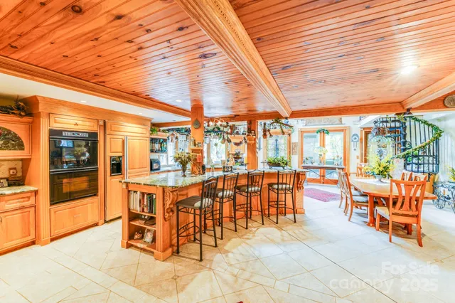 a dining room with large window