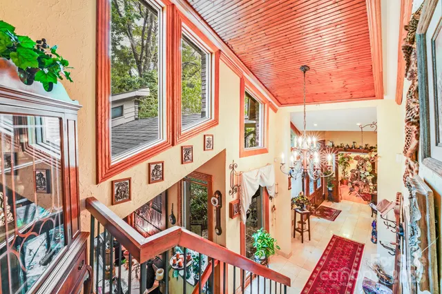 a view of a patio with a table and chairs