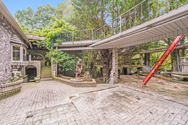 a front view of a house with outdoor space