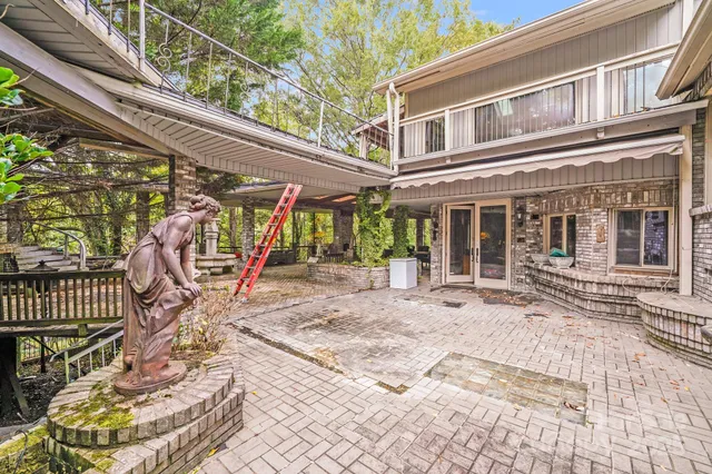 a view of a chairs and tables in the patio