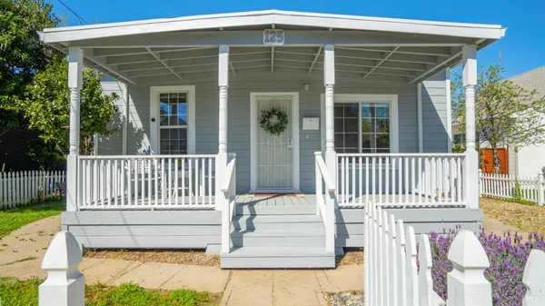 a front view of a house with a porch