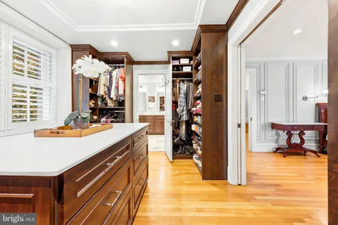 a view of kitchen island with stainless steel appliances kitchen island granite countertop a refrigerator and a stove