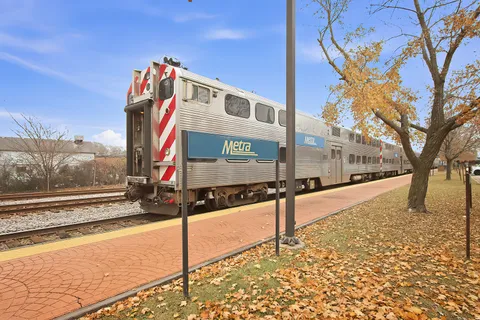 a view of a street with a building in the background