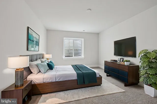 a view of an empty room and entryway