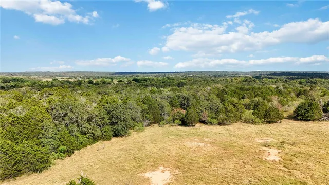 a view of a city and mountains in a room