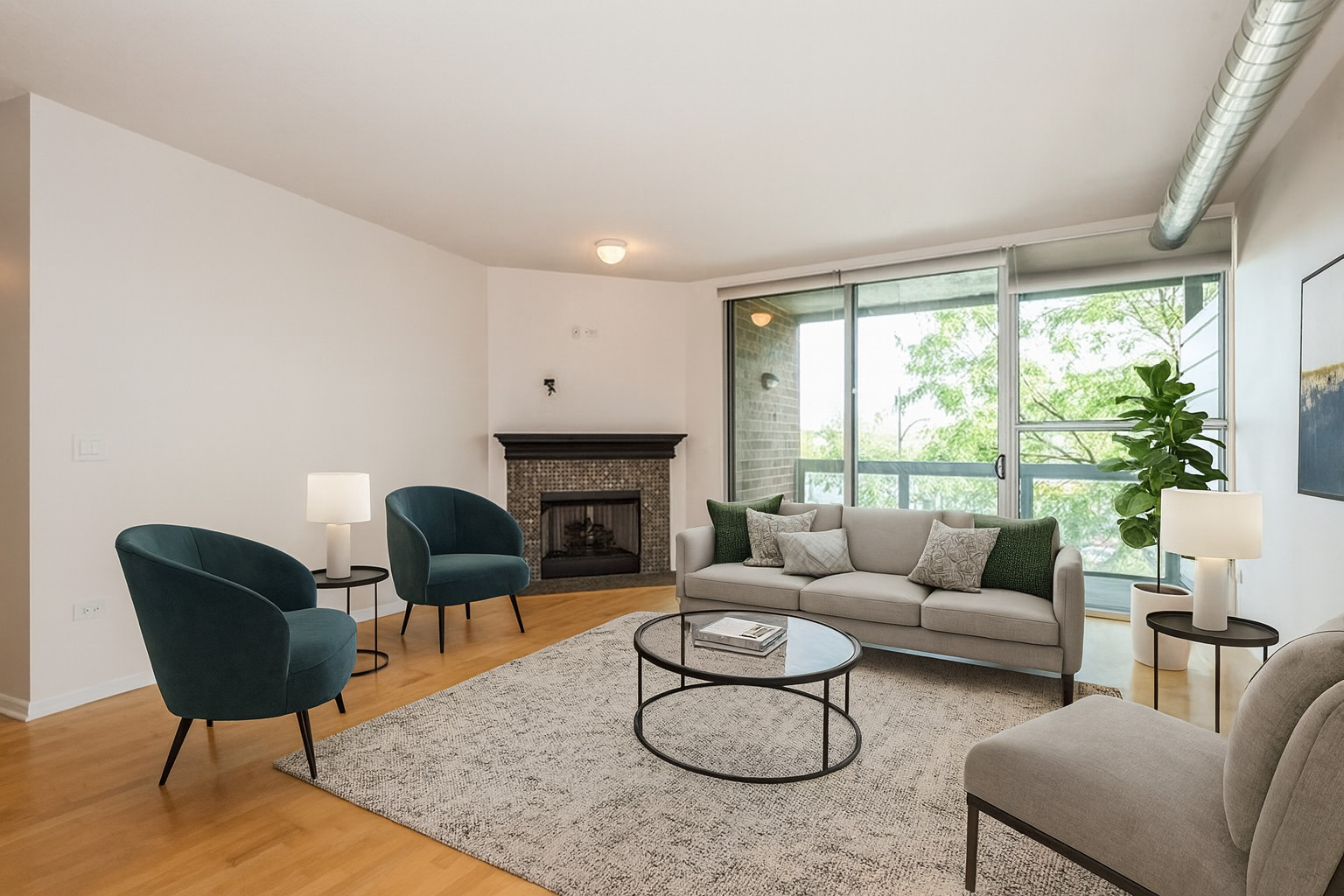 1228 Emerson Street, Unit 304 Evanston, IL 60201 - Photo 5 of 19 a living room with furniture and a fireplace
