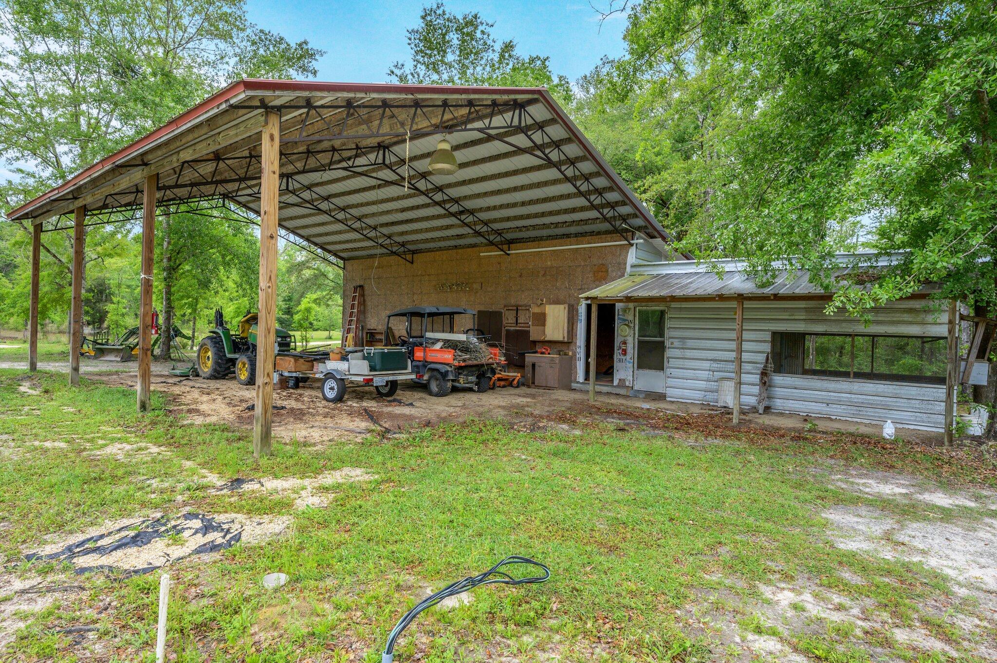6373 L & B Ranch Road Florala, AL 36442 - Photo 54 of 71 a view of a house with backyard and sitting area