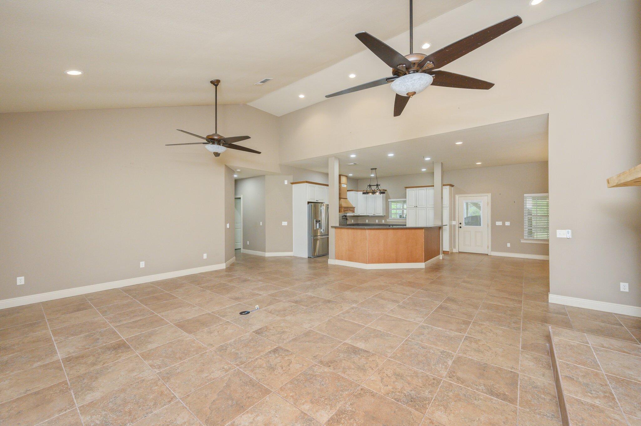 6373 L & B Ranch Road Florala, AL 36442 - Photo 8 of 71 a view of a livingroom with a ceiling fan and kitchen view