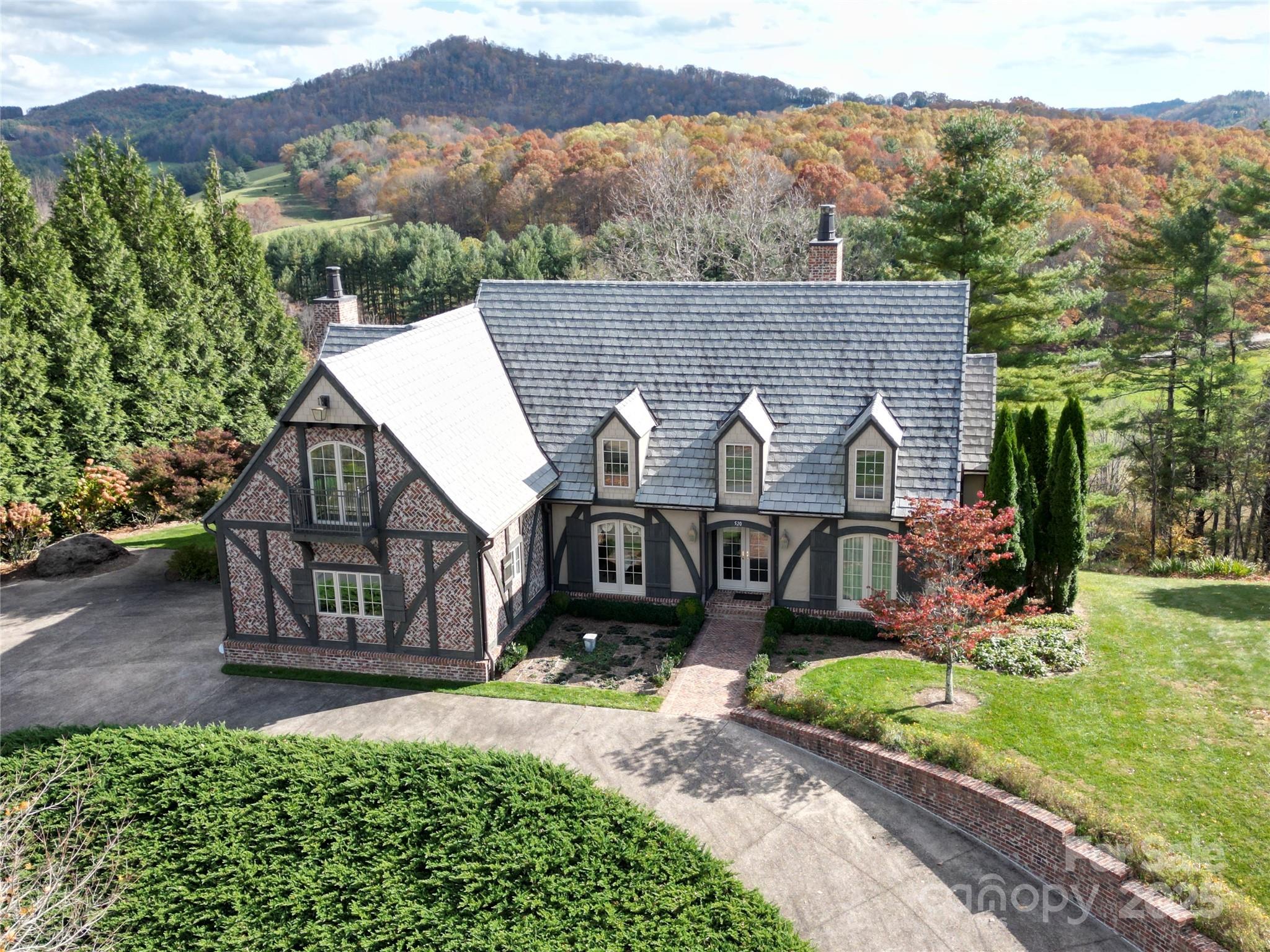 520 East Landing Ridge Circle Jefferson, NC 28640 - Photo 1 of 48 front view of a house with a yard