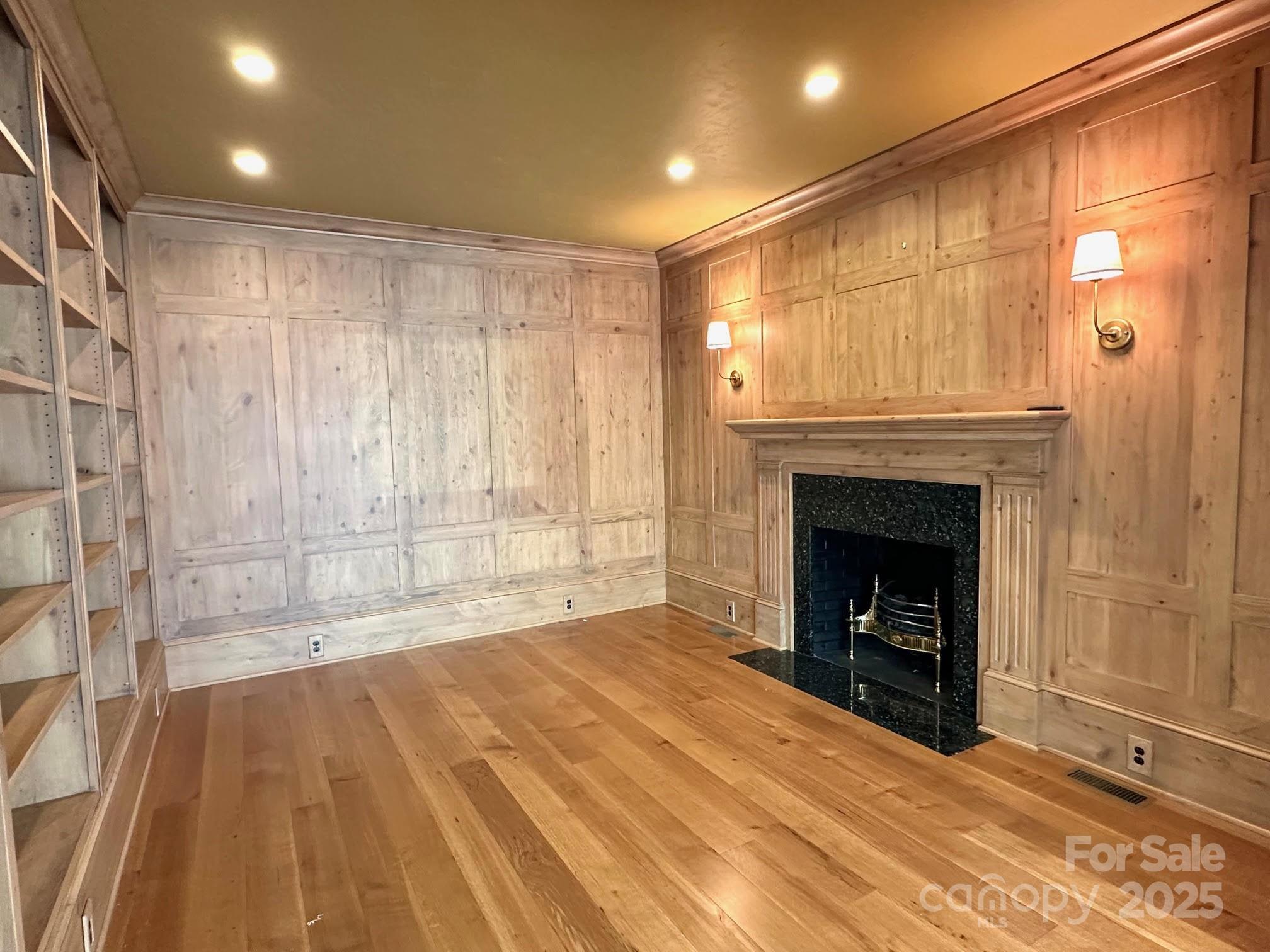 520 East Landing Ridge Circle Jefferson, NC 28640 - Photo 14 of 48 a view of an empty room with a fireplace and a window