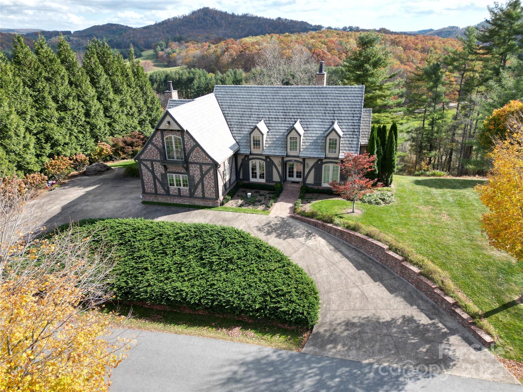 520 East Landing Ridge Circle Jefferson, NC 28640 - Photo 2 of 48 an aerial view of a house with a garden