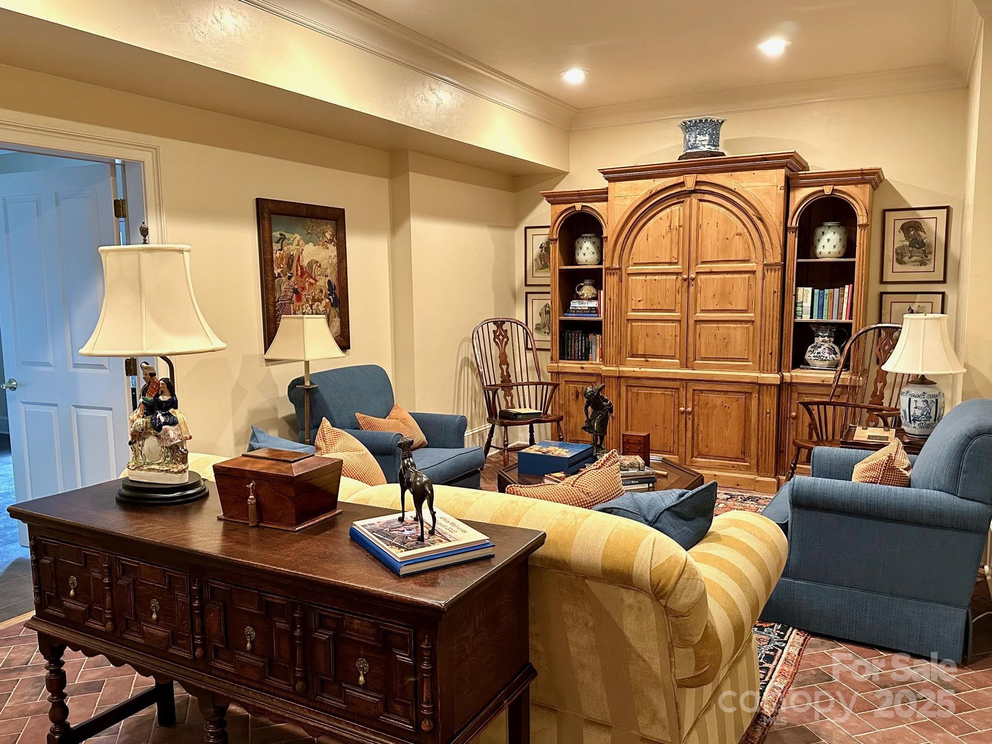 520 East Landing Ridge Circle Jefferson, NC 28640 - Photo 26 of 48 a living room with furniture a rug and a chandelier