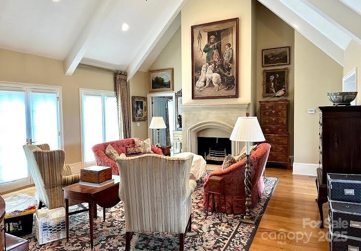 520 East Landing Ridge Circle Jefferson, NC 28640 - Photo 30 of 48 a living room with furniture a fireplace and a flat screen tv