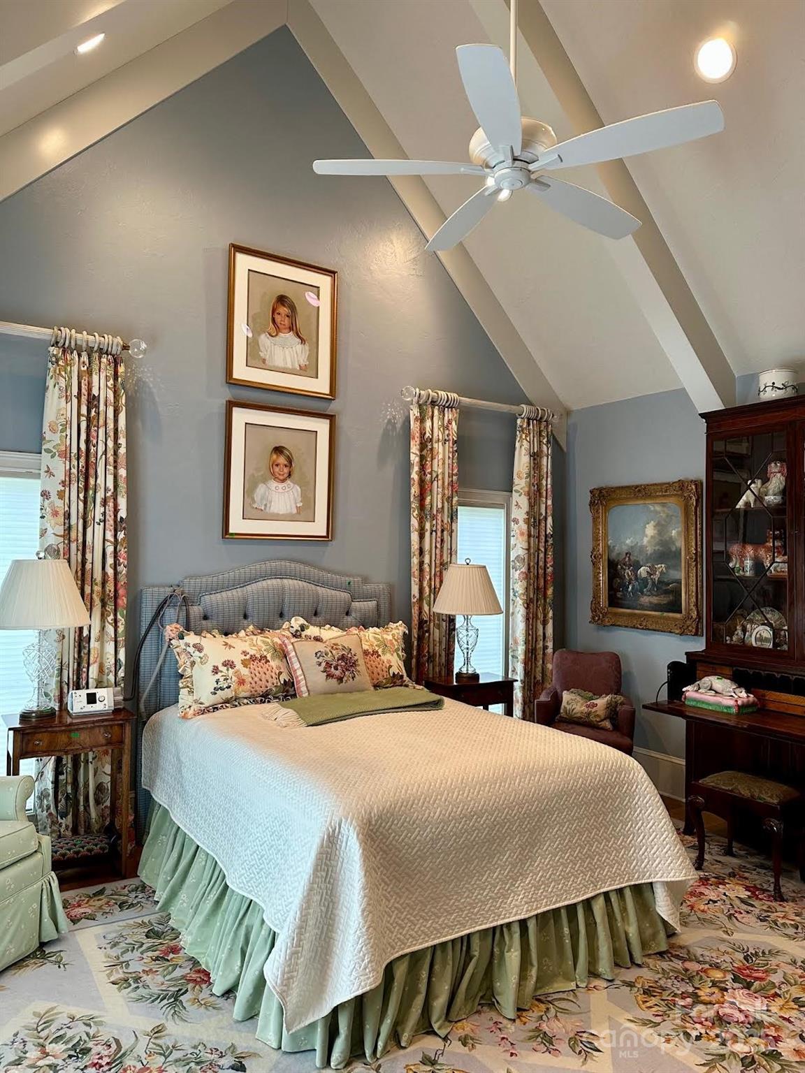 520 East Landing Ridge Circle Jefferson, NC 28640 - Photo 35 of 48 a bedroom with a bed table chair and painting on the wall