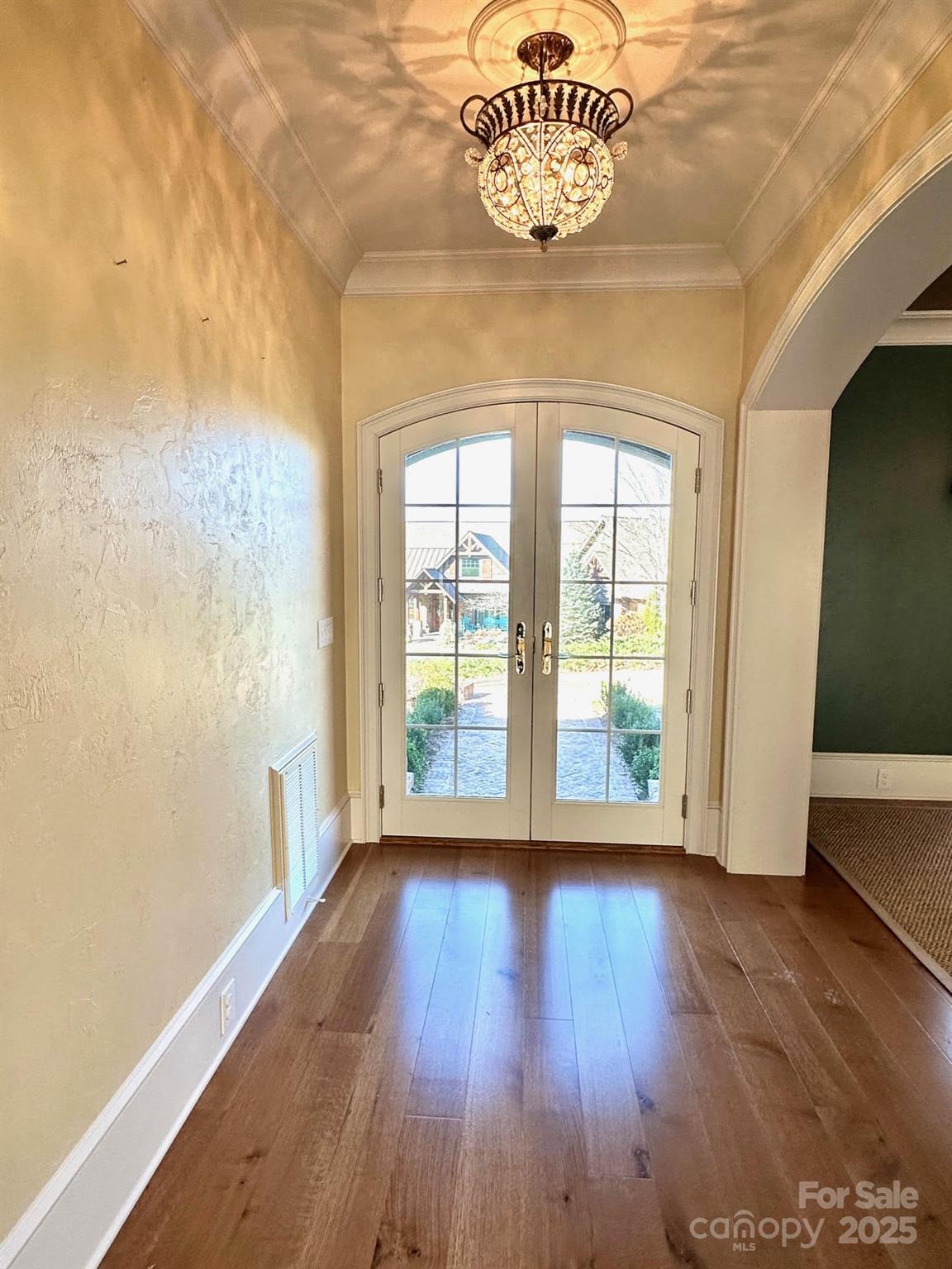 520 East Landing Ridge Circle Jefferson, NC 28640 - Photo 4 of 48 a view of an empty room with wooden floor and a window
