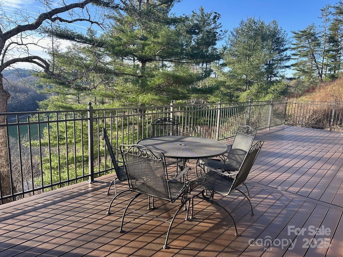 520 East Landing Ridge Circle Jefferson, NC 28640 - Photo 43 of 48 a view of a chairs and table in the balcony